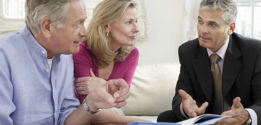 senior couple discussing retirement financial planning