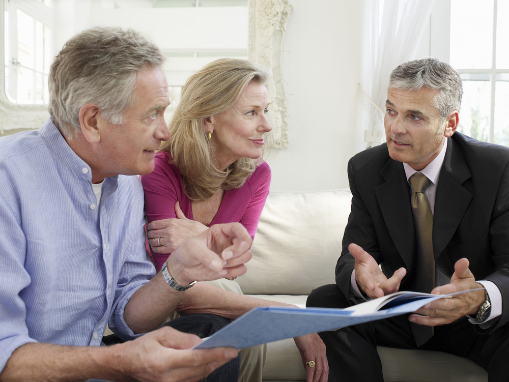 senior couple discussing retirement financial planning