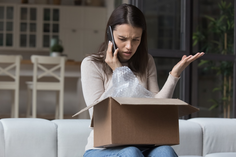irritated customer with courier delivery