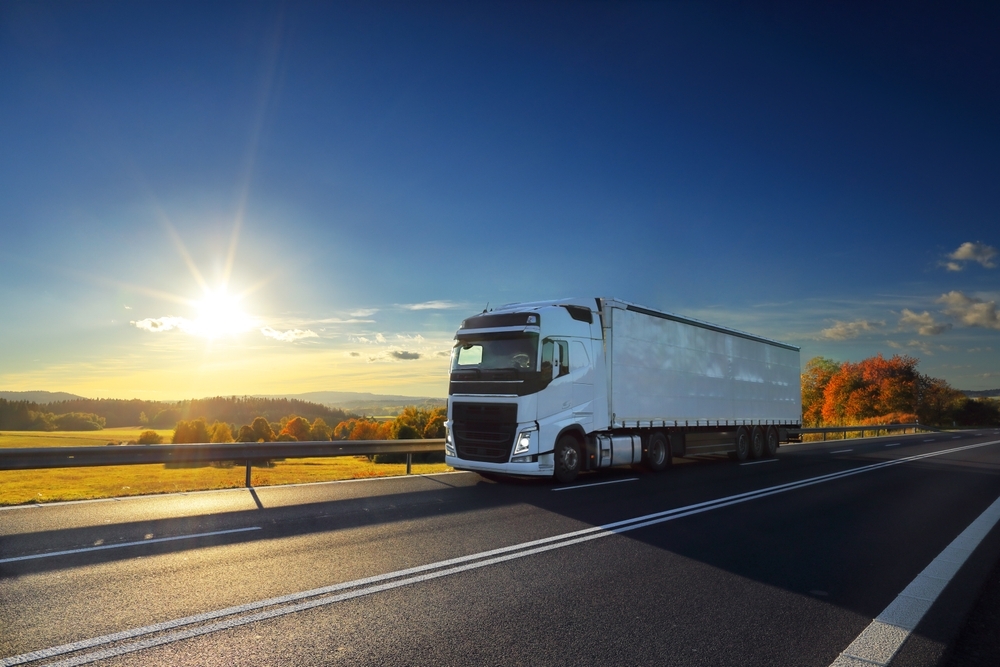 truck carrying cargo goods | cargo insurance